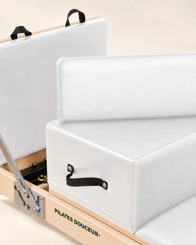 Wooden Folding Reformer – detail of the white upholstery and box